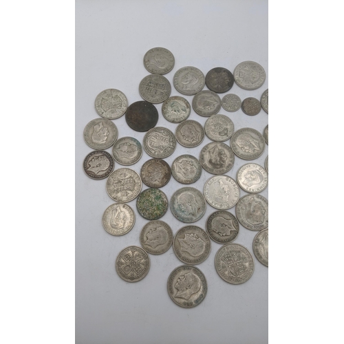 187 - A collection of 1920's/1946 British silver coinage to include half crowns and others, total weight 5... 