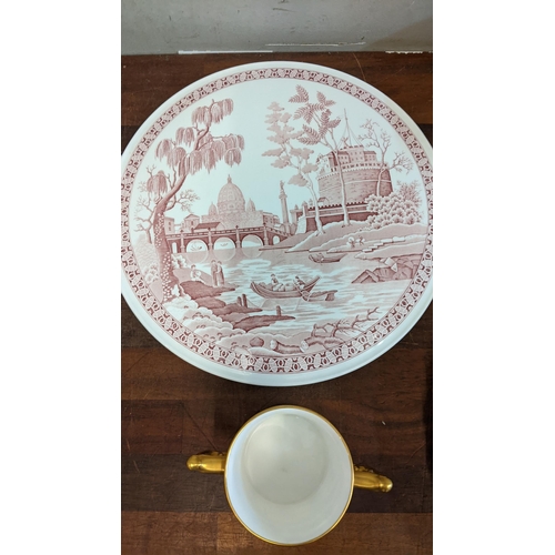 256 - Ceramics to include a Royal Crown Derby twin handled mug, a Delft charger, a Spode cake plate and a ... 