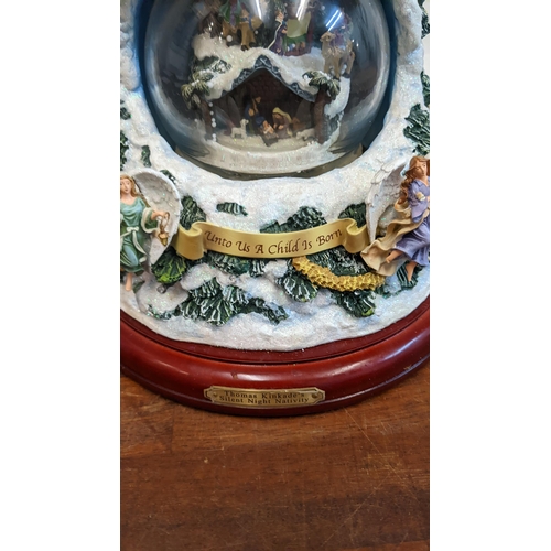 258 - A Bradford Exchange Silent Night nativity snow-globe tree
Location: A4B
If there is no condition rep... 