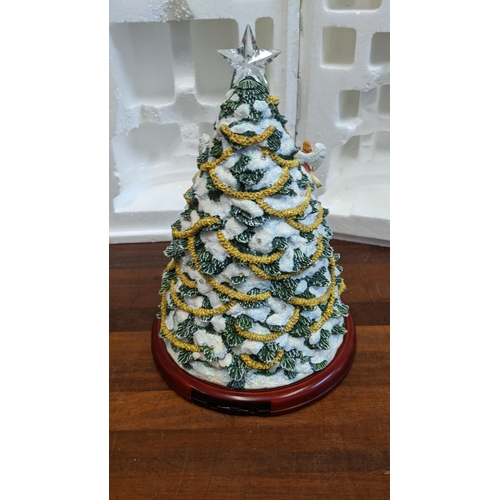 258 - A Bradford Exchange Silent Night nativity snow-globe tree
Location: A4B
If there is no condition rep... 