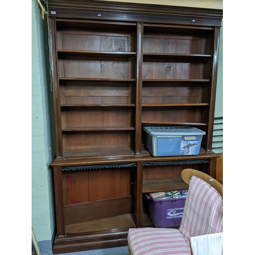 265 - A Victorian mahogany open shelf bookcase, the top with stepped cornice over eight adjustable shelves... 