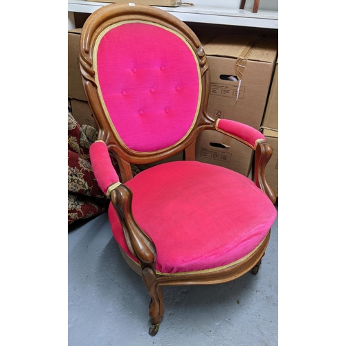 267 - An early 20th century mahogany framed upholstered open armchair with carved decoration, upholstered ... 