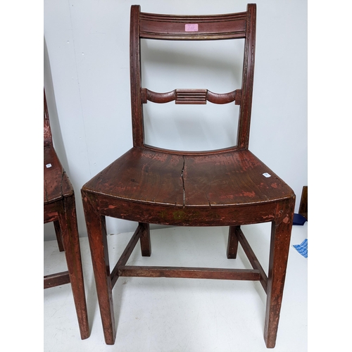 268 - A matched pair of early 19th century country side chairs, red painted, on square tapering front legs... 