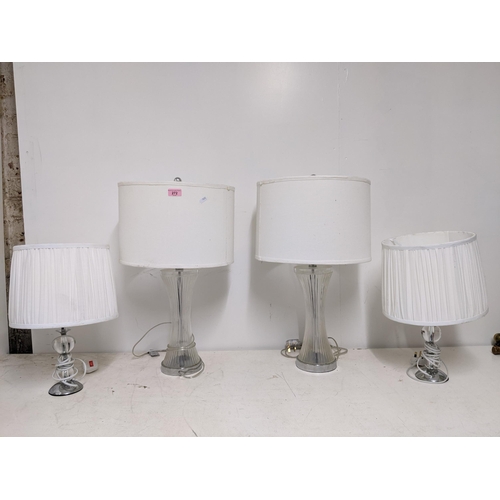 272 - Two pairs of contemporary Perspex and polished metal table lamps with fabric shades Location:
If the... 