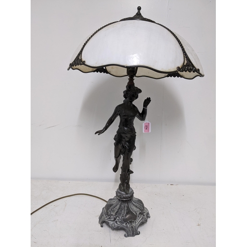 274 - A contemporary patinated metal figural table lamp base with Tiffany style shade with four opal glass... 