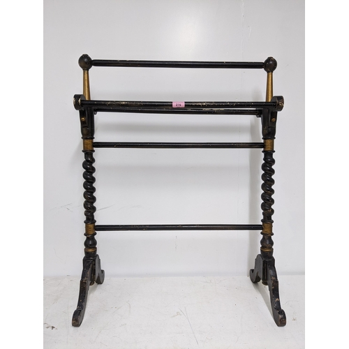 276 - A Victorian ebonized and gilded towel rail in the aesthetic style 89cm h x 70cm w Location:
If there... 