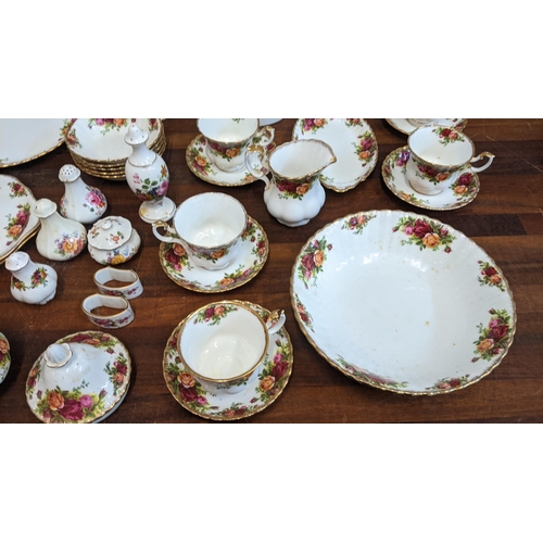 323 - A collection of teaware to include mostly Royal Albert Country Roses pattern items and Royal Crown D... 