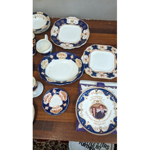 324 - A collection of blue and white teaware to include a Royal Albert Heirloom pattern dish, Coronation w... 