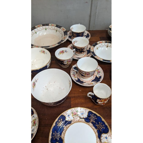 324 - A collection of blue and white teaware to include a Royal Albert Heirloom pattern dish, Coronation w... 