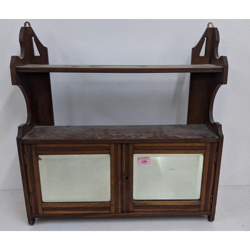 330 - A mid/late 20th century small hanging unit with a shelf and two mirrored doors
Location: A2F
If ther... 