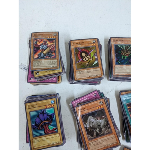 336 - A collection of Yu-Gi-Oh cards, trading card game along with official rulebook
Location: A3F
If ther... 