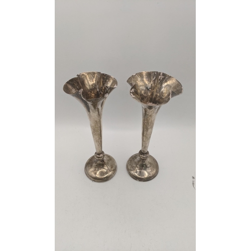 83 - A pair of silver trumpet shaped vases, weighted, hallmarked Birmingham 1905, 16.5cm h Location:R1.3
... 