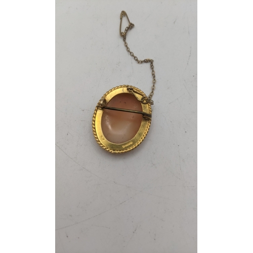 13 - A Victorian cameo brooch faceted in a 9ct gold mount, with safety chain
Location:
If there is no con... 