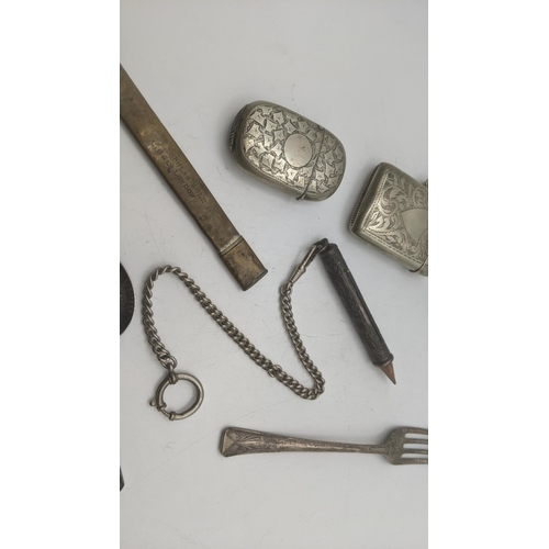 19 - A mixed lot to include a silver fork, sterling silver teaspoon and a white metal teaspoon stamped 80... 