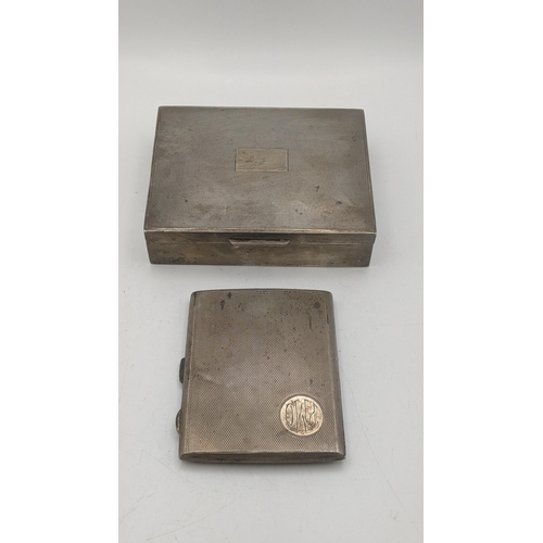 26 - A silver cigarette case with engine turned design having a gilt interior 83.9g, together with a ciga... 