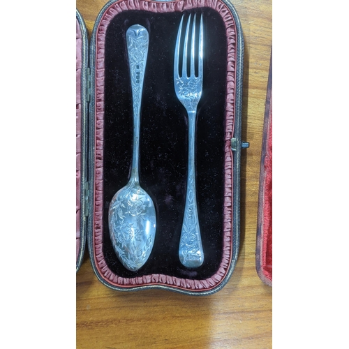 28 - Mixed silver to include a Christening set comprising of a floral engraved fork and spoon, a pair of ... 