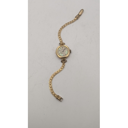 32 - A Medana ladies 9ct gold wristwatch on a gold plated bracelet, total weight 11.7g A/F Location:
If t... 