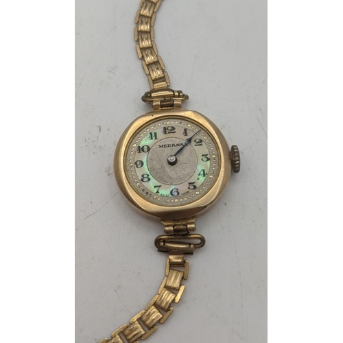 32 - A Medana ladies 9ct gold wristwatch on a gold plated bracelet, total weight 11.7g A/F Location:
If t... 