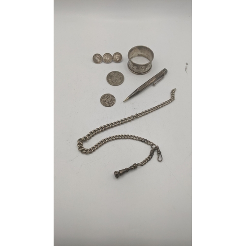 33 - A mixed lot to include a silver pocket watch chain and pendant, along with a napkin ring 44.7g, toge... 