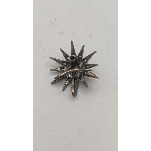 34 - A Victorian old cut diamond white metal star celestial brooch, 2.9g
Location:
If there is no conditi... 