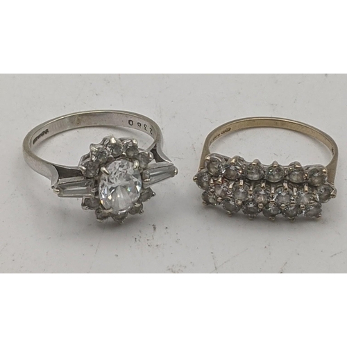 38 - Two 9ct gold ladies rings to include a 9ct white gold paste stone cluster ring, together with a yell... 