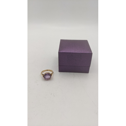 4 - A gold ring stamped 18k set with an amethyst coloured stone, size N, 4.7g
Location:
If there is no c... 