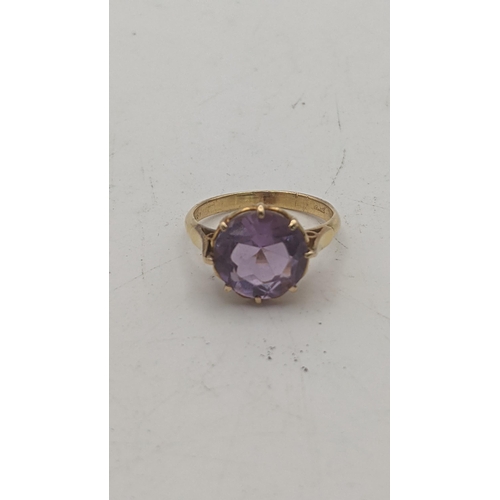 4 - A gold ring stamped 18k set with an amethyst coloured stone, size N, 4.7g
Location:
If there is no c... 