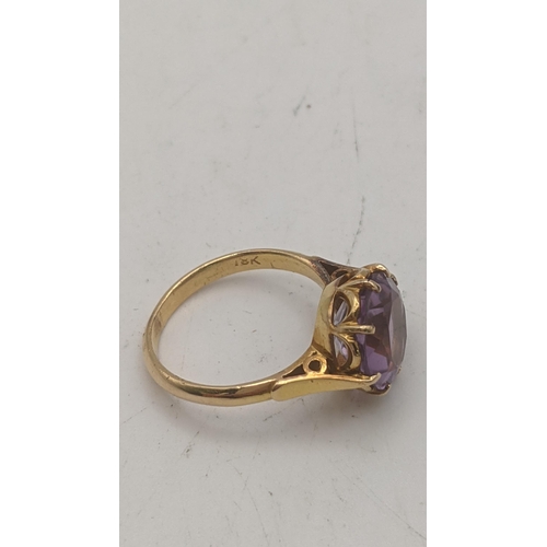 4 - A gold ring stamped 18k set with an amethyst coloured stone, size N, 4.7g
Location:
If there is no c... 