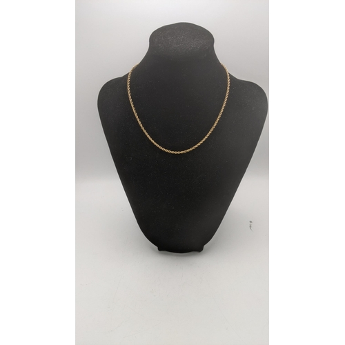 41 - A yellow gold rope twist necklace with gold plated clasps tested as 9ct Location:
If there is no con... 