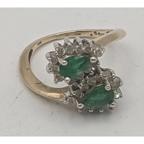 44 - Emerald and diamond pear shaped emeralds surrounded by 24 small brilliant cut diamonds in a 9ct whit... 