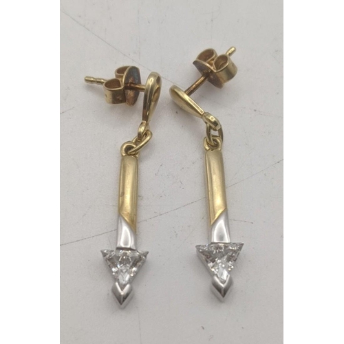 57 - A  pair of 9ct two gold arrow shaped drop stud earrings set with past stones 2.6g
Location
If there ... 