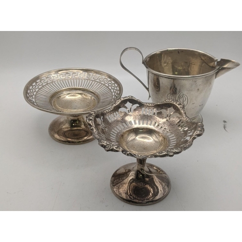 61 - Silver to include two pedestal pin dishes both having a pierced design together with a majestic ster... 