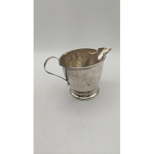 61 - Silver to include two pedestal pin dishes both having a pierced design together with a majestic ster... 