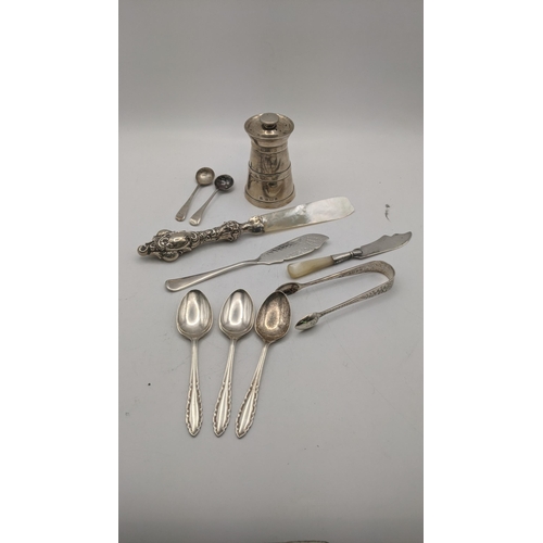 65 - Silver items to include a pepper grinder hallmarked Birmingham 1907, together with a pir of sugar to... 