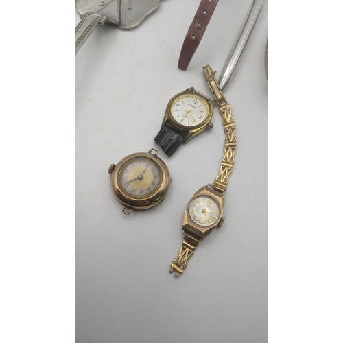 68 - Two 9ct gold cased ladies wristwatches, one with a Dennison (case back 2.3g), a silver teaspoon and ... 