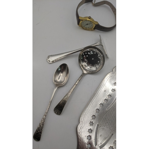 68 - Two 9ct gold cased ladies wristwatches, one with a Dennison (case back 2.3g), a silver teaspoon and ... 