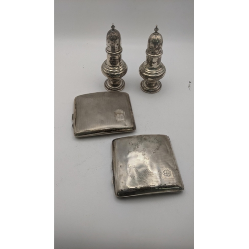 70 - Silver to include two engine turned cigarette cases, one example hallmarked Birmingham 1930, total w... 