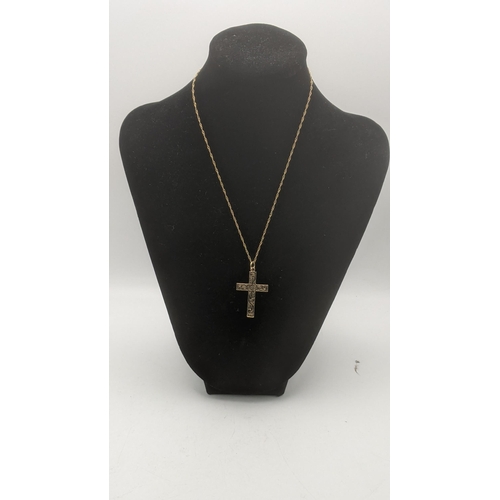 9 - A yellow gold crucifix pendant, tested as 9ct gold, on a 9ct gold necklace
Location:
If there is no ... 