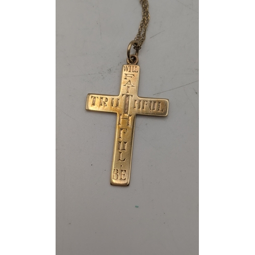 9 - A yellow gold crucifix pendant, tested as 9ct gold, on a 9ct gold necklace
Location:
If there is no ... 