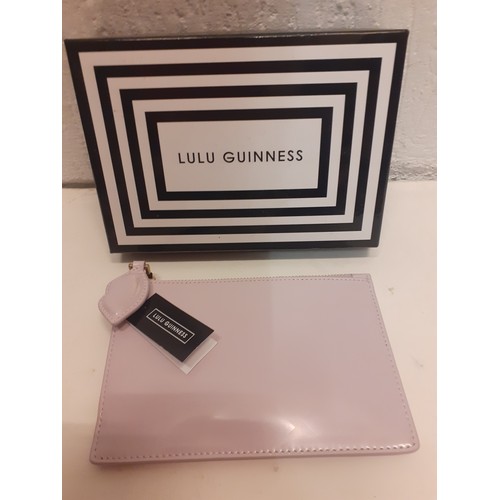 11 - Lulu Guinness- a boxed pale pink polished leather Emily clutch bag style:50118328 having a subtle li... 