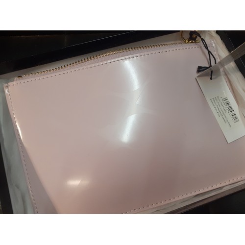 11 - Lulu Guinness- a boxed pale pink polished leather Emily clutch bag style:50118328 having a subtle li... 