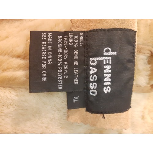 62 - Dennis Basso- Two ladies sheepskin coats comprising a black example (2 front buttons missing) size X... 