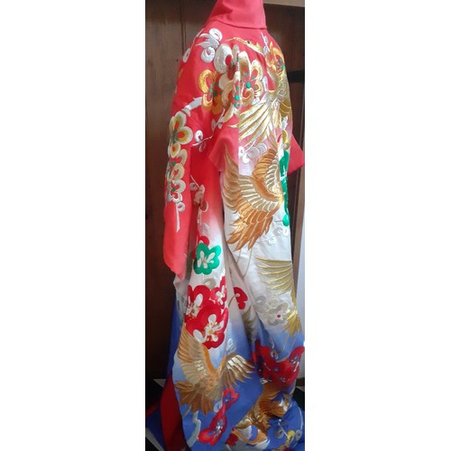 45 - A Japanese heavily embroidered Uchikake/wedding kimono robe in colourful blues, reds, green and gold... 