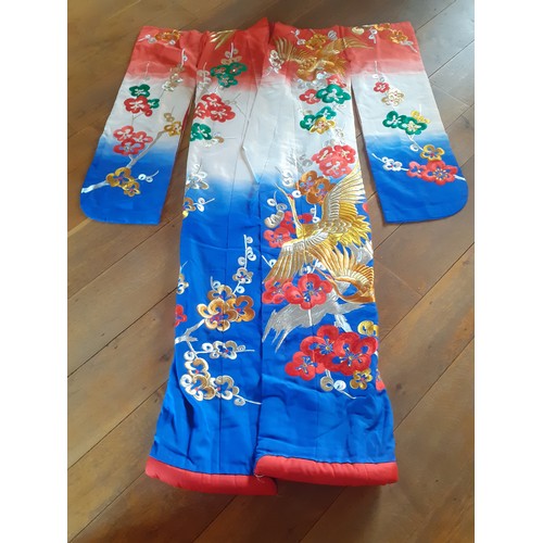 45 - A Japanese heavily embroidered Uchikake/wedding kimono robe in colourful blues, reds, green and gold... 