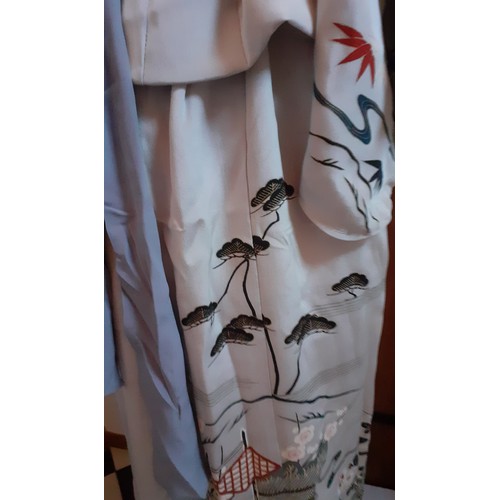 46 - A Japanese pale grey kimono with dark grey sash belt and printed images of a Japanese garden in blac... 