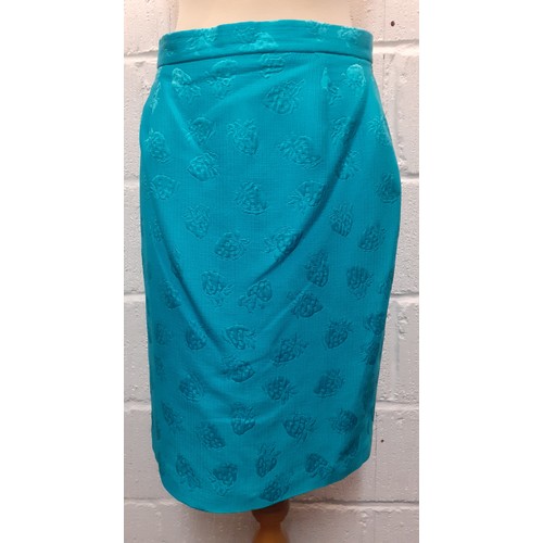 18 - Louis Feraud & Escada-A turquoise 2 piece skirt suit having a raised strawberry design with gold ton... 