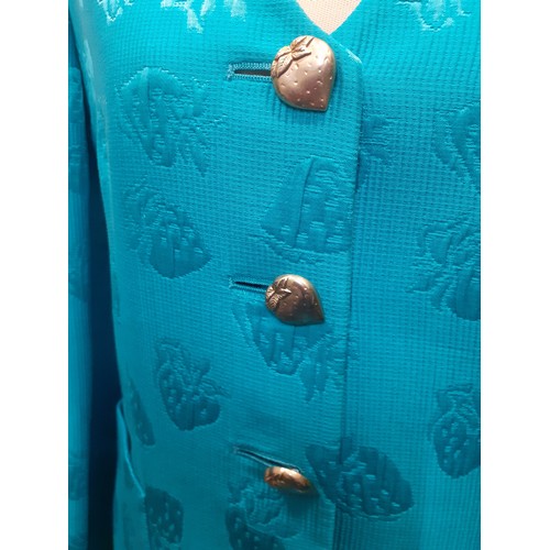 18 - Louis Feraud & Escada-A turquoise 2 piece skirt suit having a raised strawberry design with gold ton... 