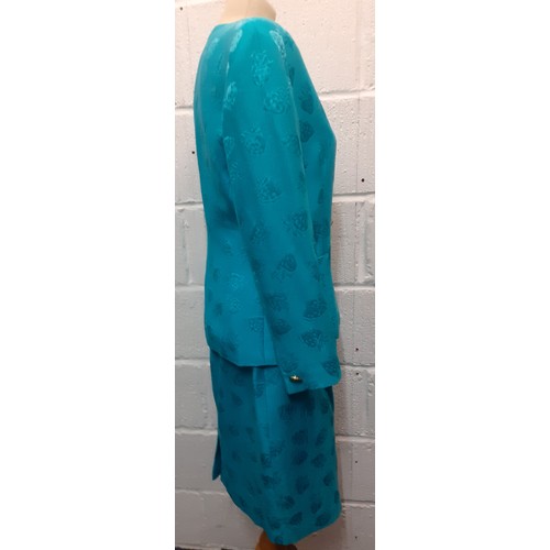 18 - Louis Feraud & Escada-A turquoise 2 piece skirt suit having a raised strawberry design with gold ton... 