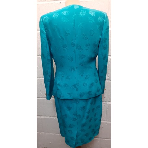 18 - Louis Feraud & Escada-A turquoise 2 piece skirt suit having a raised strawberry design with gold ton... 