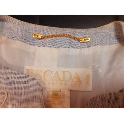 18 - Louis Feraud & Escada-A turquoise 2 piece skirt suit having a raised strawberry design with gold ton... 